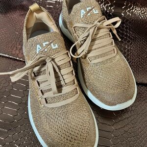 APL Metallic Gold Knit Sneakers lightweight